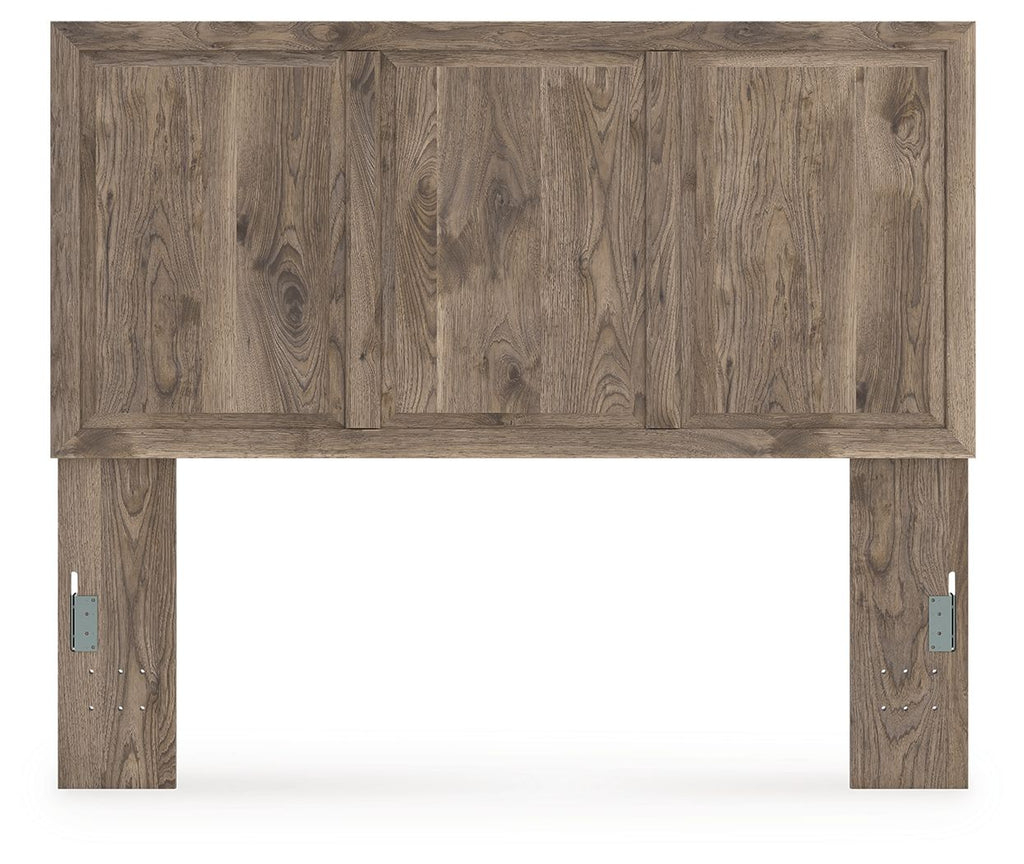 Light brown panel headboard with raised wood grain and metal mounting brackets