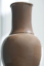 Brown ceramic vase with glossy neck and rounded shoulder