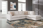Light stone fabric sectional sofa with corner chaise and patterned accent pillows