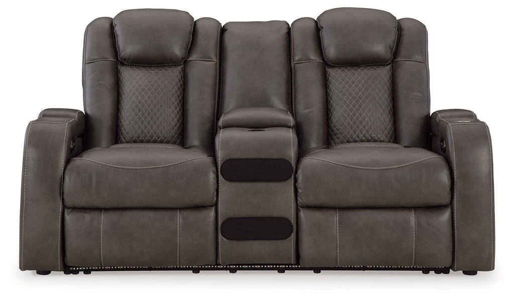 Dark gray power reclining loveseat with center console and squared padded armrests