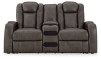 Dark gray power reclining loveseat with center console and squared padded armrests