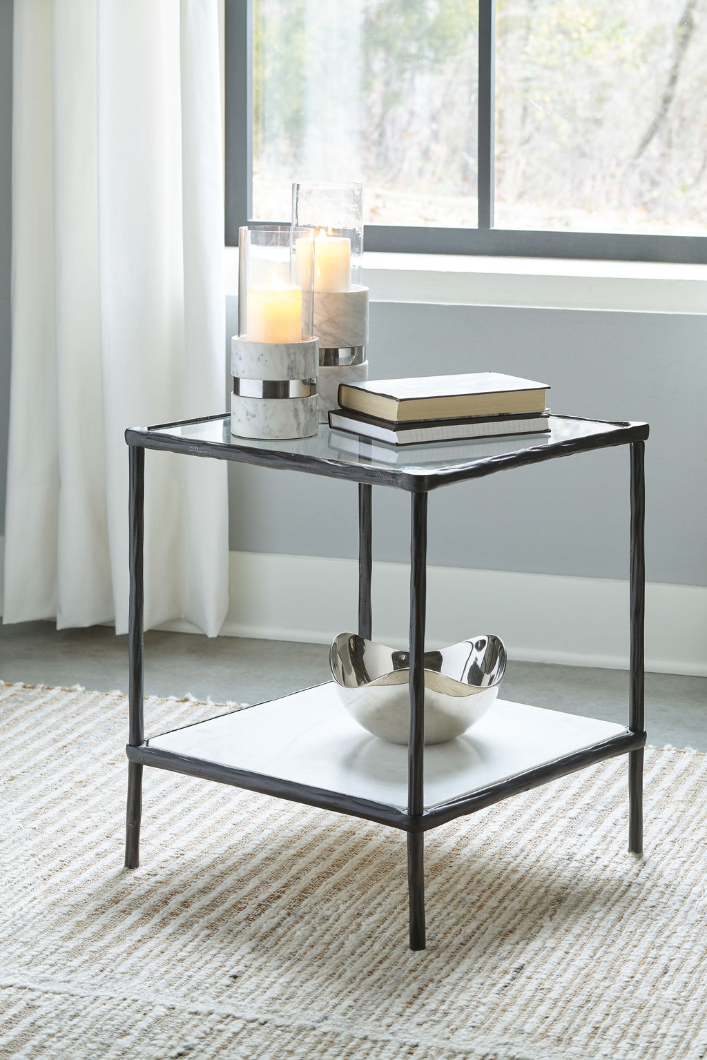 Accent table with two-tier glass top and dark metal frame