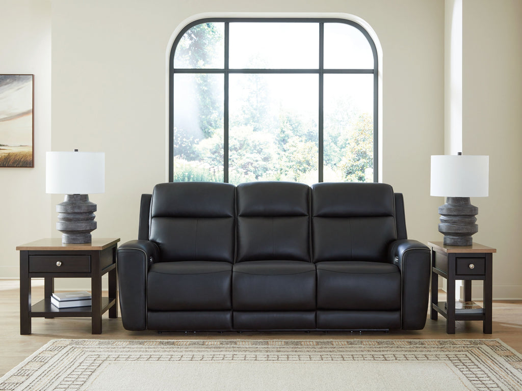 Power reclining sofa with adjustable headrests, black upholstery, three wide seat cushions
