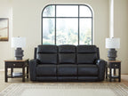 Power reclining sofa with adjustable headrests, black upholstery, three wide seat cushions