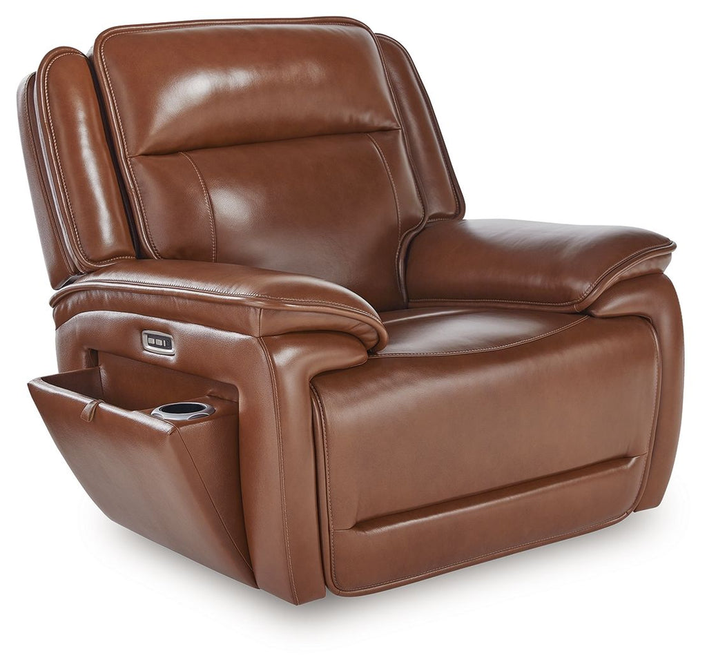 Chocolate brown power recliner with adjustable headrest, padded arms and side control panel.
