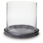 Glass cylinder candle holder with dark base and open top