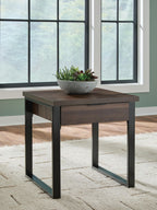 Rectangular dark brown table with drawer, set in a room with window light