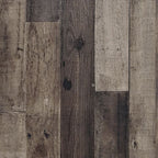 Wood panel bed frame close-up showing dark distressed plank panels