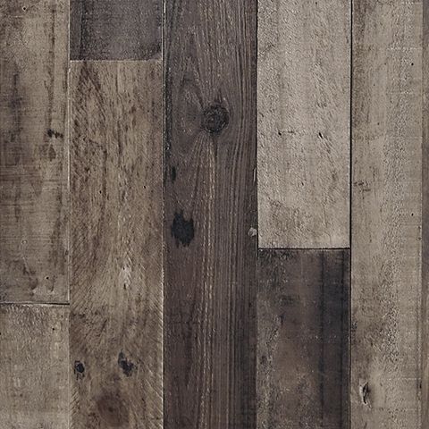 Distressed gray wood mirror frame close-up with visible grain and scuffs