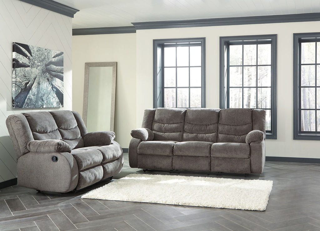 Gray loveseat and reclining sofa, plush fabric upholstery with two seat cushions