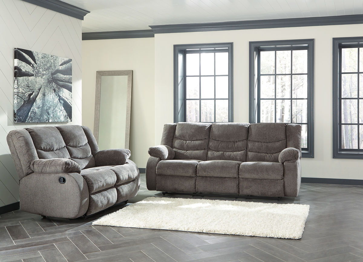 Gray loveseat and reclining sofa, plush fabric upholstery with two seat cushions