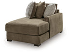 RAF corner chaise with coffee-brown upholstery, wide arm, and three decorative pillows