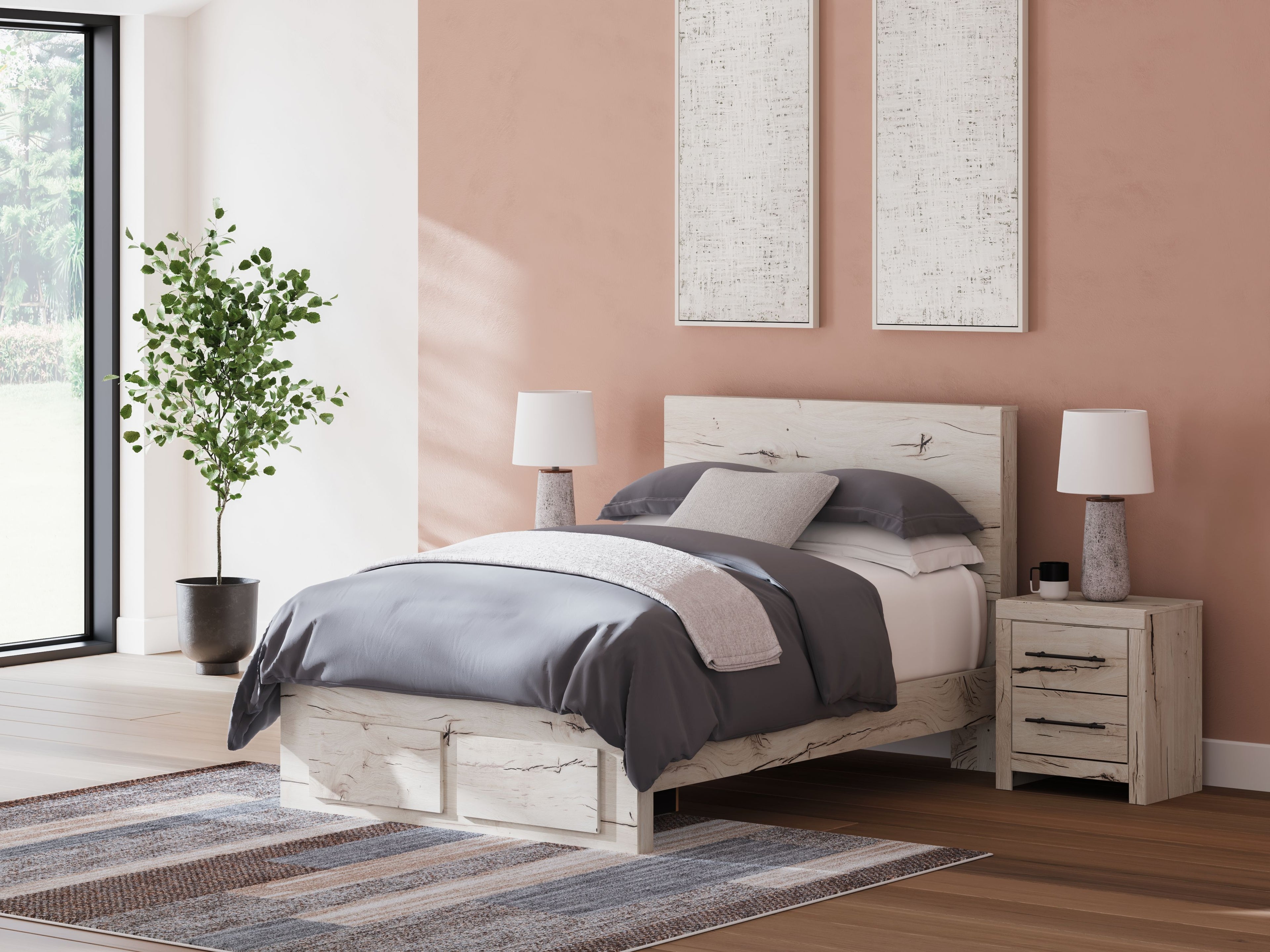 Light wood panel bed with storage drawers, gray bedding with neutral pillows