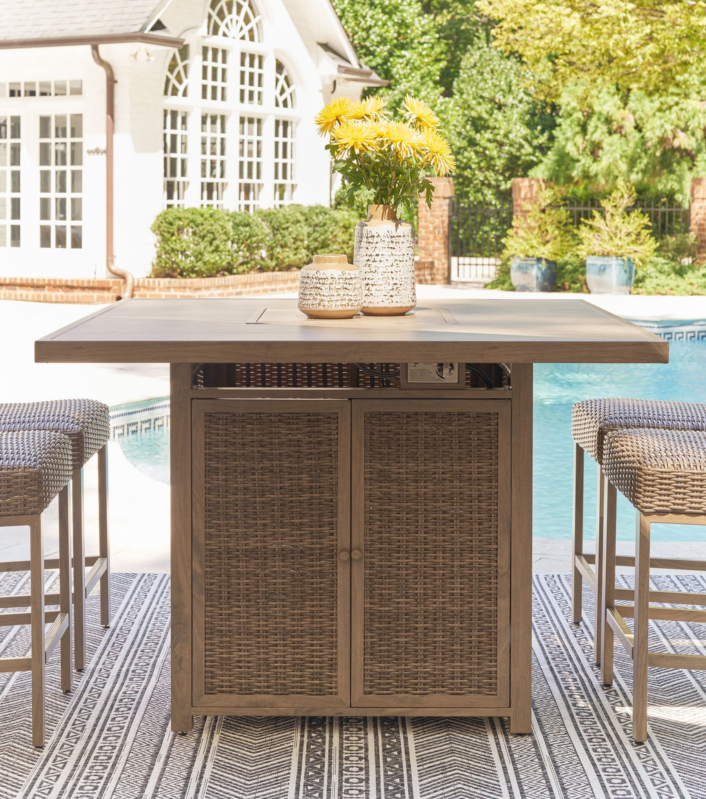 Square fire pit bar table with wood top, open fire bowl, woven rattan cabinet doors