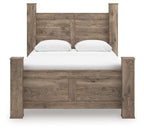 Light brown poster bed with paneled headboard, white mattress, and two pillows