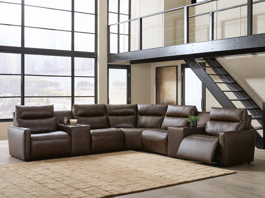 Dark brown power reclining sectional sofa with padded headrests and reclined chaise