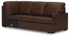 Corner wedge sofa in dark brown fabric, tufted back and chaise-style seat