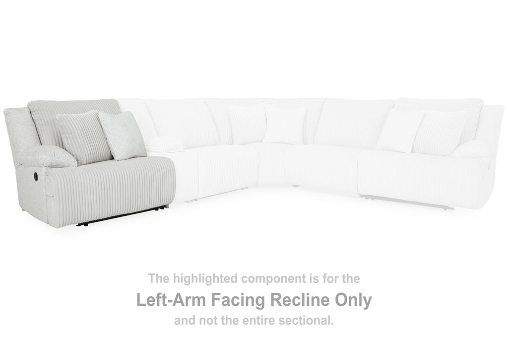Left-arm facing sectional with chaise in light gray ribbed upholstery