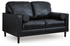 Onyx leather-look loveseat with circular arm details and deep two-seat cushions