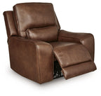Caramel power recliner chair shown reclined with extended footrest and headrest.