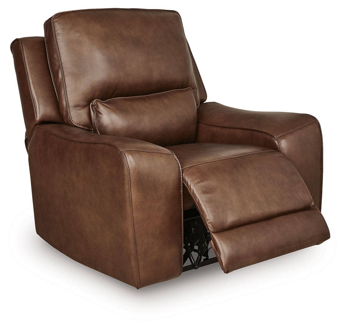 Caramel power recliner chair shown reclined with extended footrest and headrest.