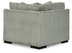 Light gray wedge sofa section with ribbed upholstery, deep seat, and square arms
