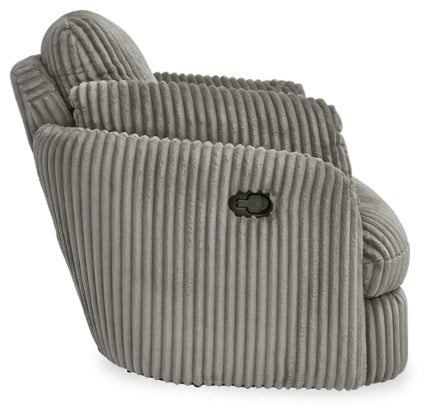 Gray corduroy swivel glider recliner with plush ribbed upholstery and rounded armrests.
