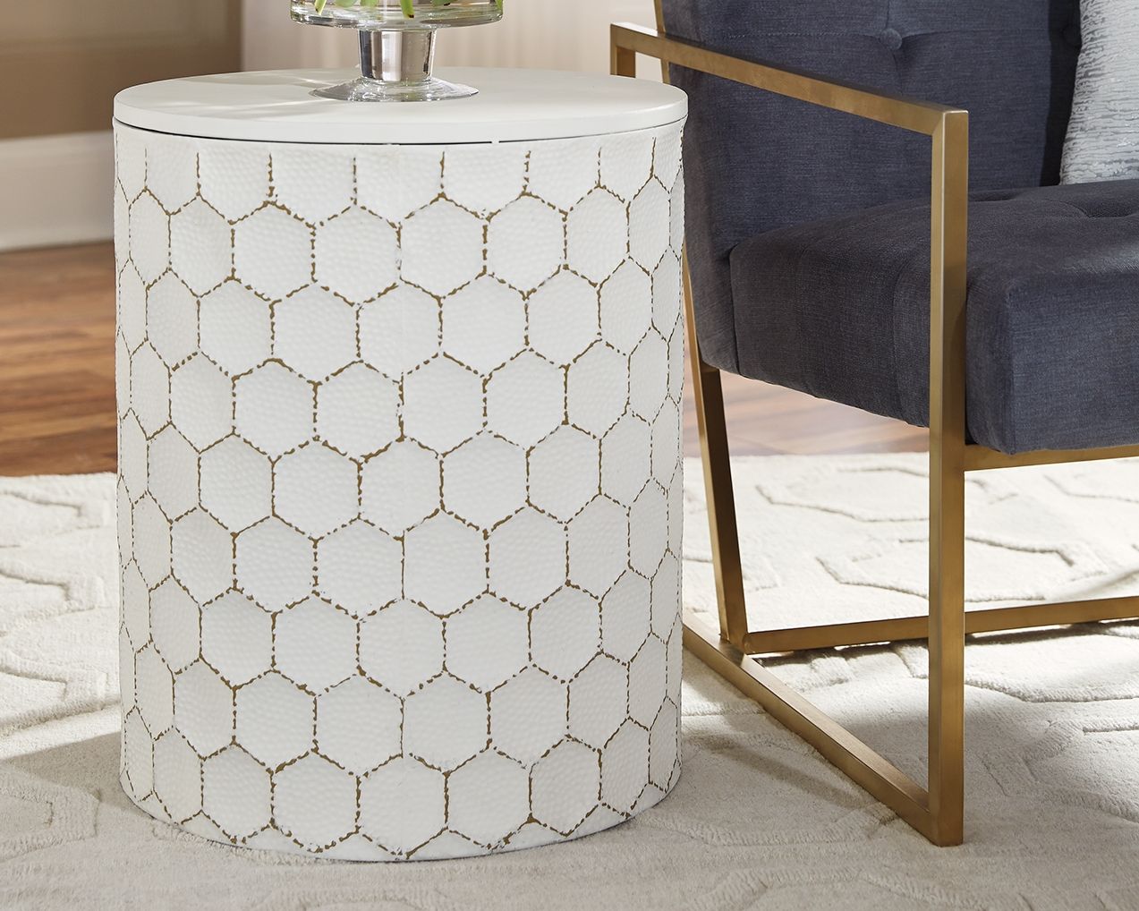 White round upholstered stool with lattice pattern, shown with legs