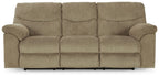Reclining sofa in textured beige fabric with three seat sections and rolled armrests.