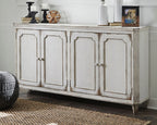 Antique white accent cabinet with four paneled doors and distressed finish