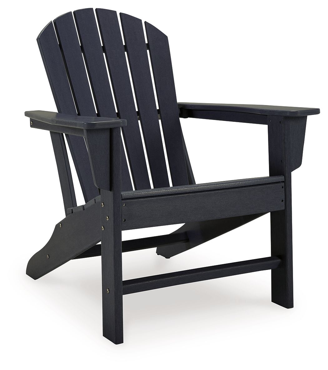 Outdoor Adirondack chair in dark blue wood slats, wide arms and curved back.