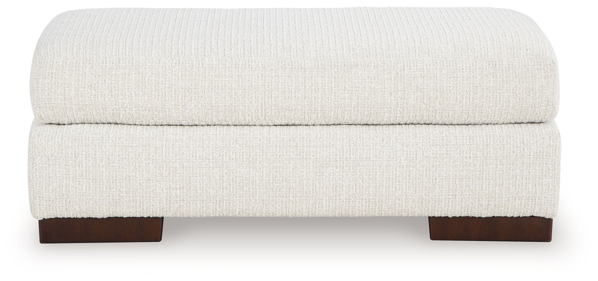 Cream upholstered ottoman with rounded top and dark wooden feet, low profile