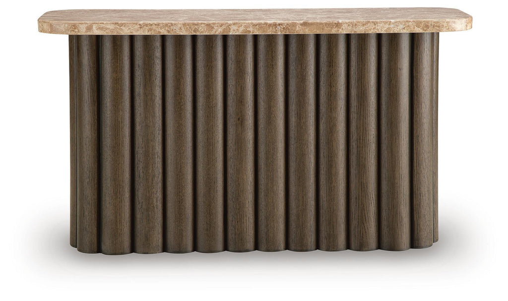 Wooden side table with speckled light top and vertical ribbed pedestal base