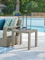 Beige square outdoor table with inset light top and four corner legs