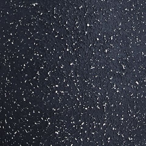 Speckled black metal lamp base texture close-up