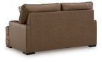 Caramel-brown loveseat with wide arms and low, block-style legs