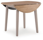 Round drop-leaf dining table with natural top, gray legs, one leaf lowered