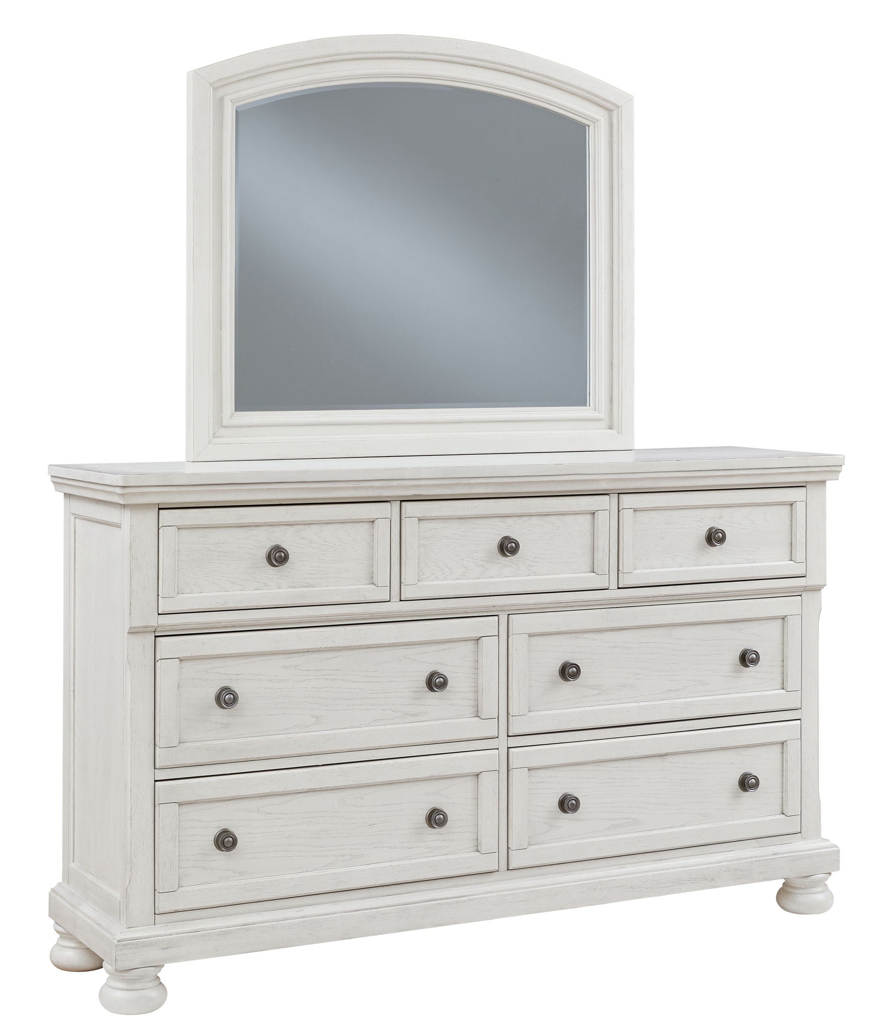 Antique white dresser with arched mirror, six drawers, metal knobs, turned feet.