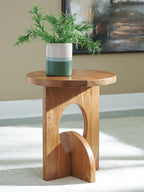 Hollbourne brown accent table with round top and arched side opening
