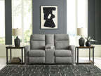 Gray double recline loveseat with padded arms and two recline sections