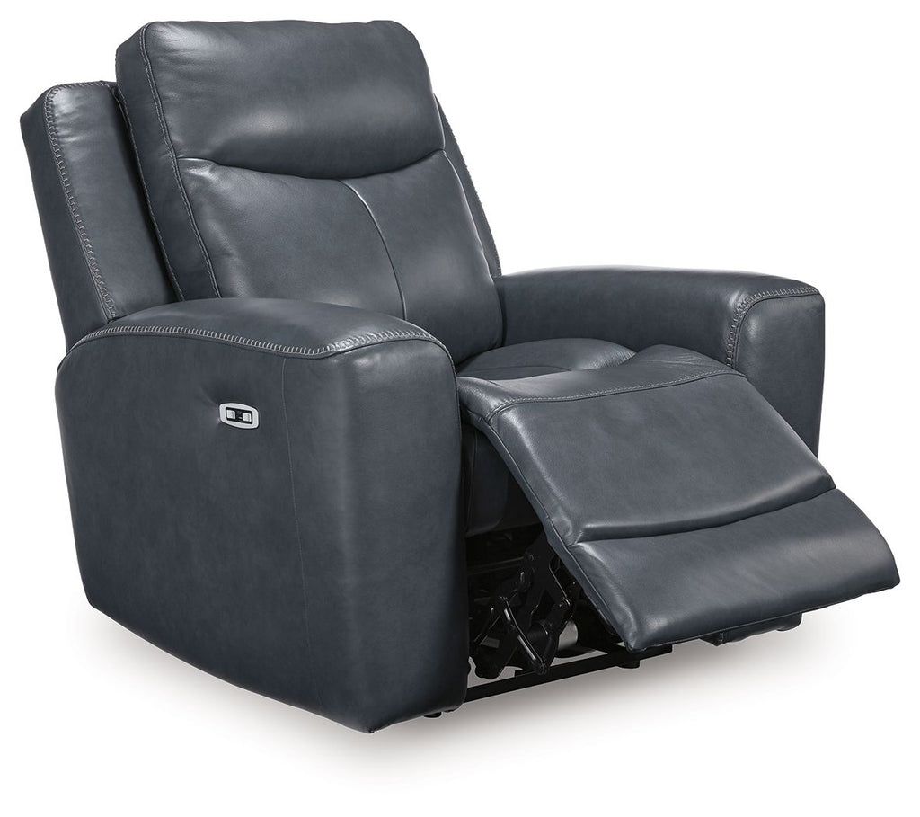 Blue leather-look power recliner with tall adjustable headrest and wide padded arms