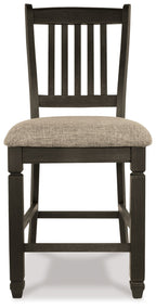 Two-tone barstool with vertical slatted back and padded light-gray seat, dark frame