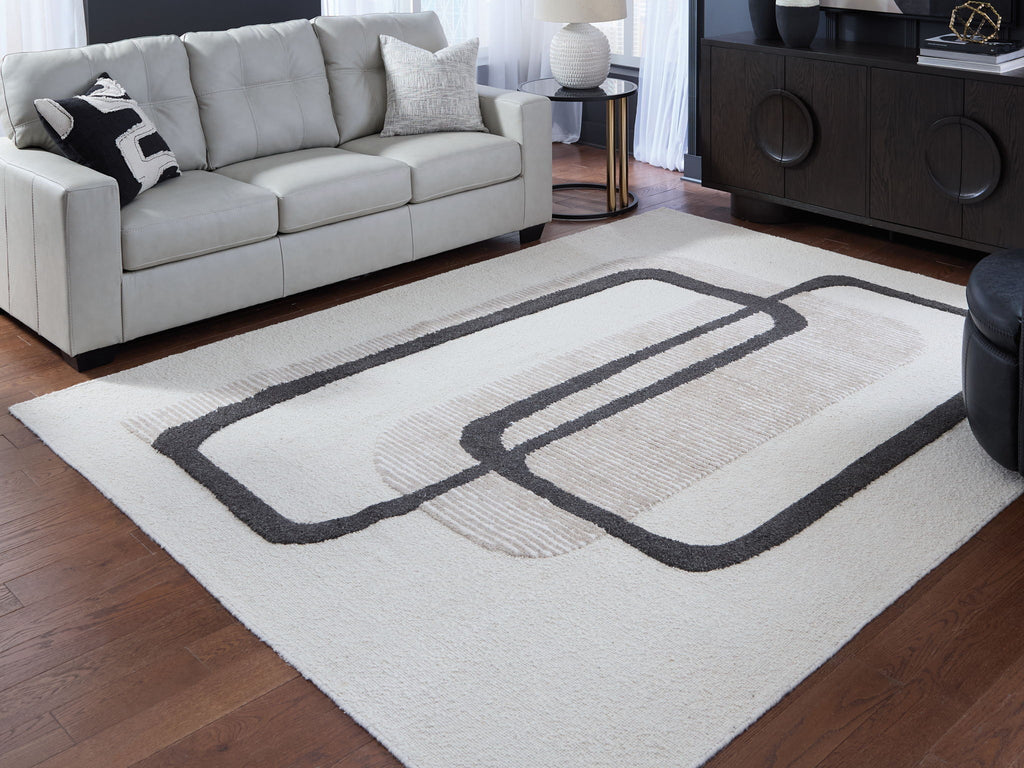 Beige rug with bold black geometric rectangles