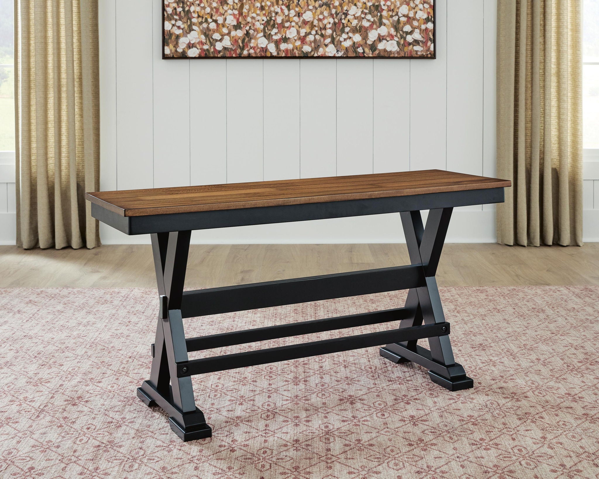 Dark brown dining bench with black X supports and slatted underframe.