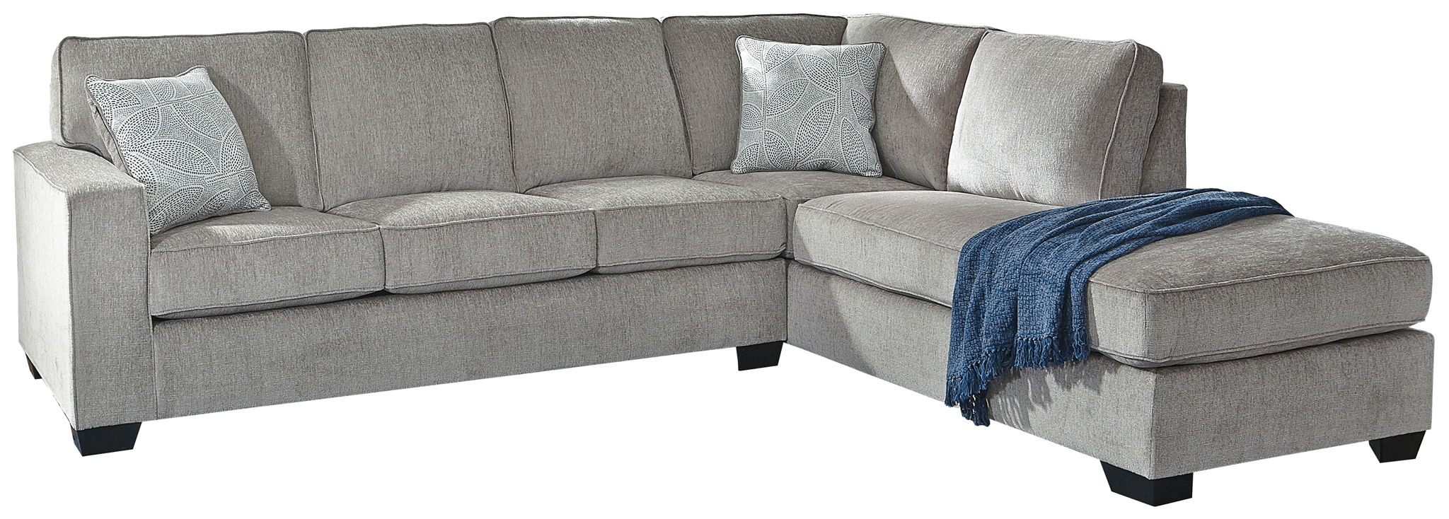 Light gray sectional sleeper sofa with right chaise, tufted cushions, and armrest pillows