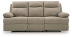 Light beige reclining sofa with tufted back and three-panel seat design