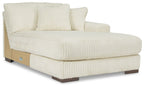 Ivory right-arm chaise with tufted seat, armrest cushion, and two back pillows