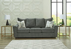 Stairatt sofa in gravel gray with three seat cushions, back pillows, and light throw pillows