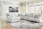 Light gray striped reclining sectional sofa with chaise and padded armrests