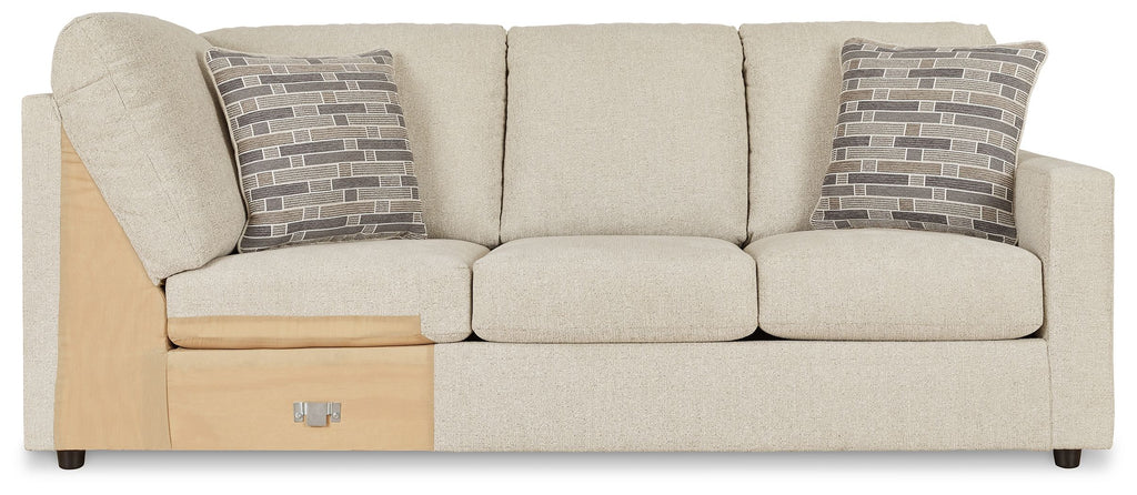 Beige loveseat sofa with two seat sections and dark framed throw pillows